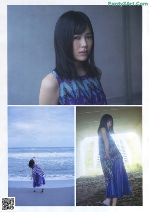 A young woman wearing a blue skirt and a colorful top.