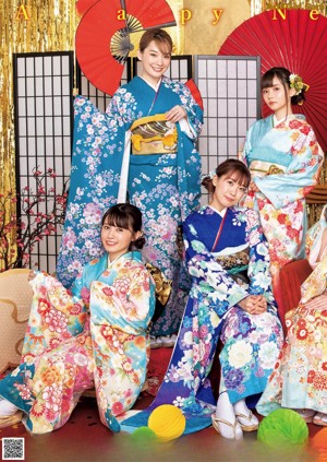 A group of women in kimonos posing for a magazine cover.